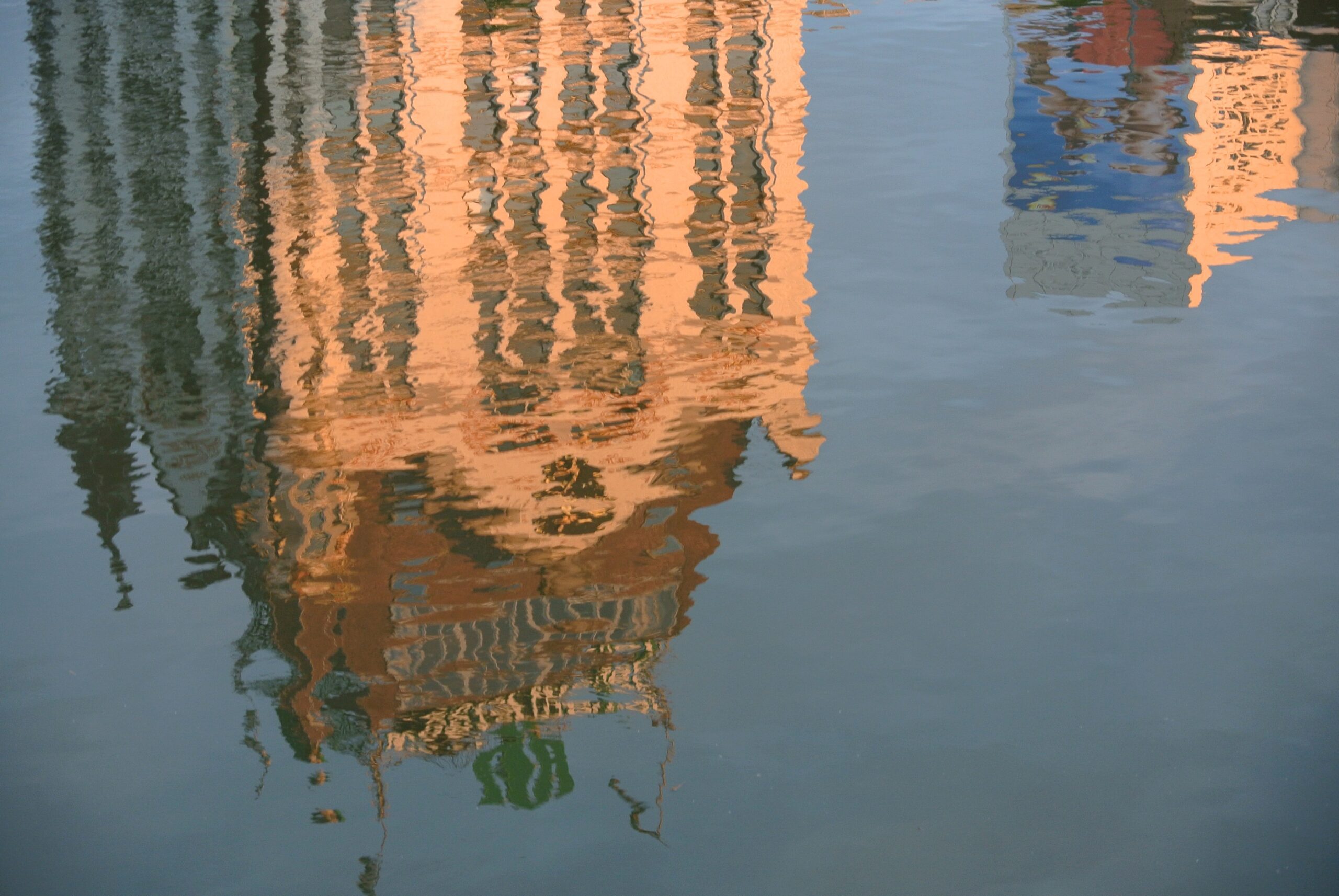 elegant building reflected into water - Impressionism - Miksang - copyright - John McQuade